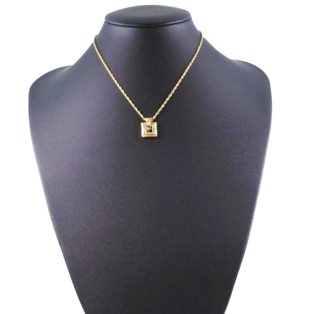Nina Ricci Gold plated signed